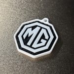 MG
